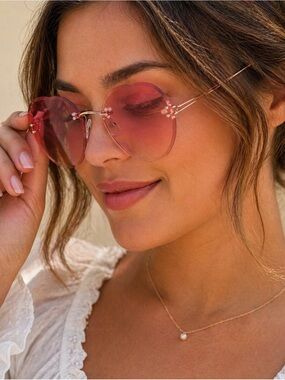 Pink Women’s Oversized Oval Rimless Sunglasses
